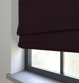 An image of our purple plumb colour roman blind in a bedroom window