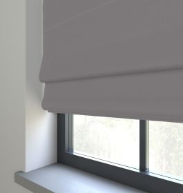 Our Prestige Silk Quicksilver Roman blind in a bedroom window
