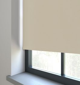 Our Amor Beige Roller blind in a living room window.