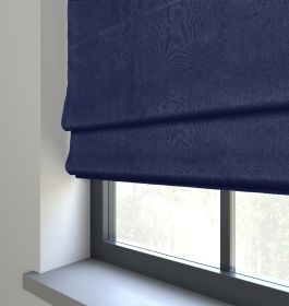 Our Rustic Weave Admiral Blue Roman blind in a living room window.