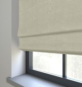 Our Rustic Weave Light Hessian Roman blind in a living room window.