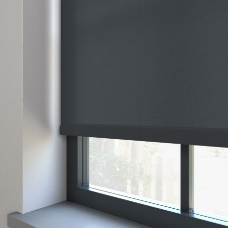 Our Burst Graphite Roller blind in a bedroom window.