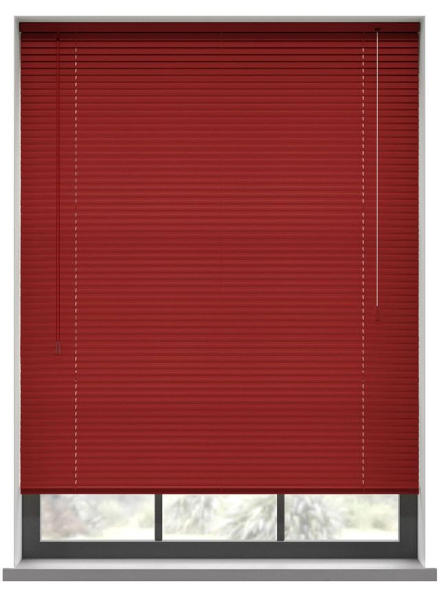 A deep red aluminium blind in a window