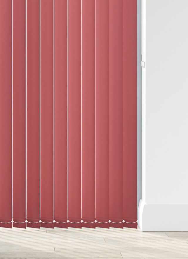 A rich red vertical blind in a bathroom