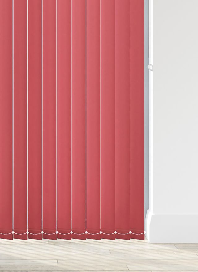 A bright red vertical blind in a living room