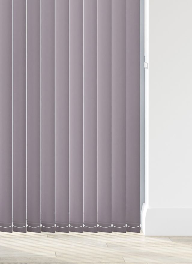 A light purple vertical blind in a bathroom