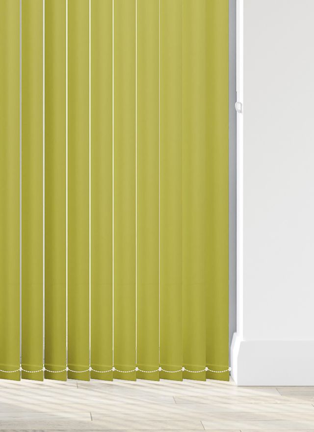 A green coloured vertical blind in a kitchen
