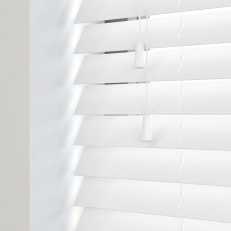 Editions Angel White - A front view of a closed white faux wooden venetian blind
