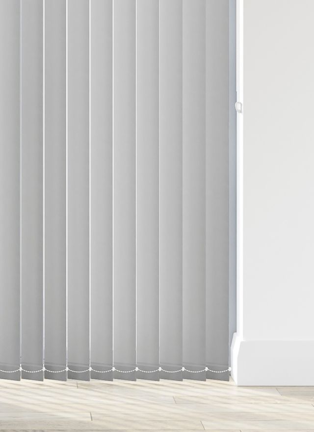 A soft blue vertical blind in a living room