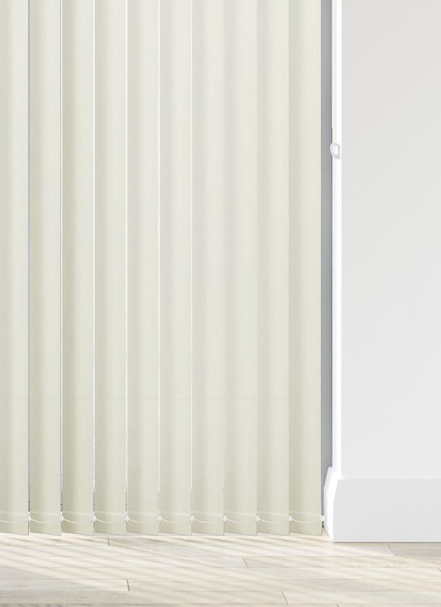 An off white vertical blind in a kitchen window