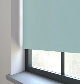 Our Amor Baby Blue Roller blind in a kitchen window.