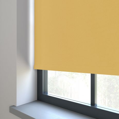 Our Amor Pastel Yellow Roller blind in a living room window.